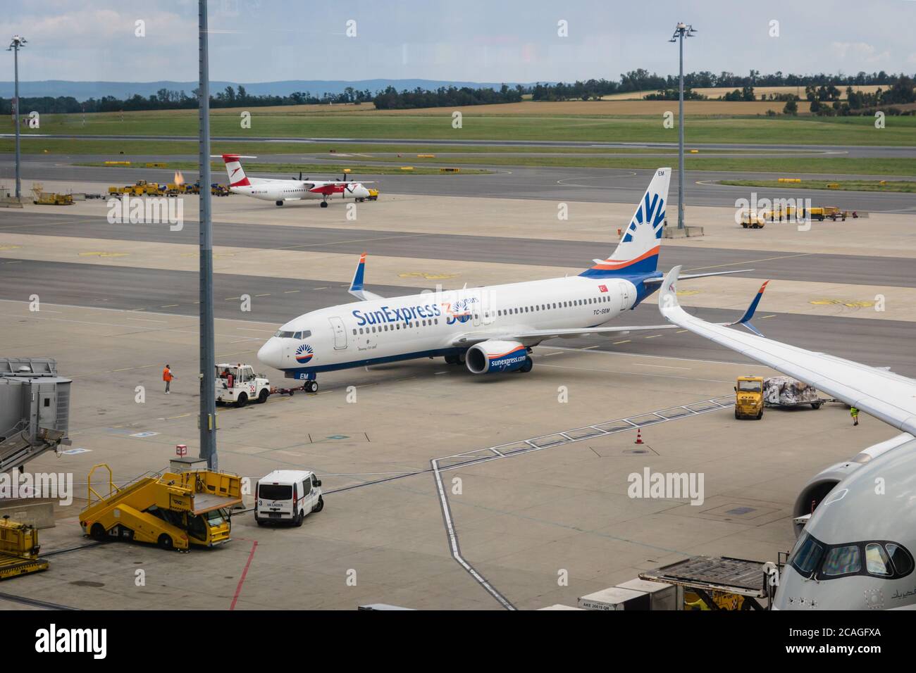 Vienna, Austria - July 2020: SunExpress aircraft on runway of Vienna  Schwechat Airtport. SunExpress, is a Turkish-German airline based in Antalya  Stock Photo - Alamy