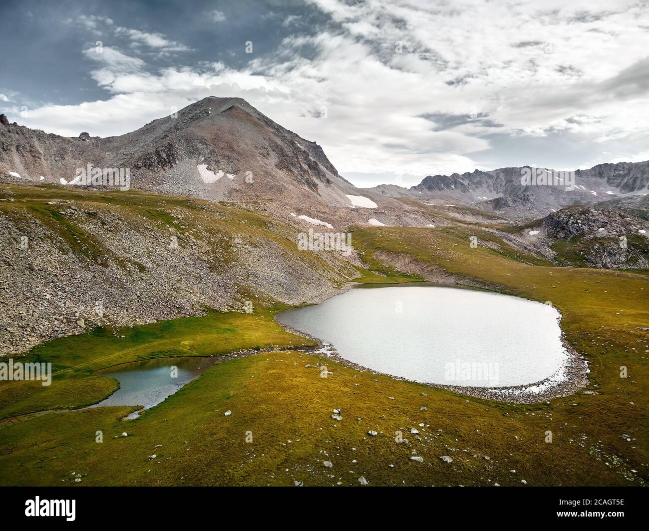 Beautiful scenery of the mountain lakes on the border Kazakhstan and Kyrgyzstan. Aerial shot on the drone Stock Photo