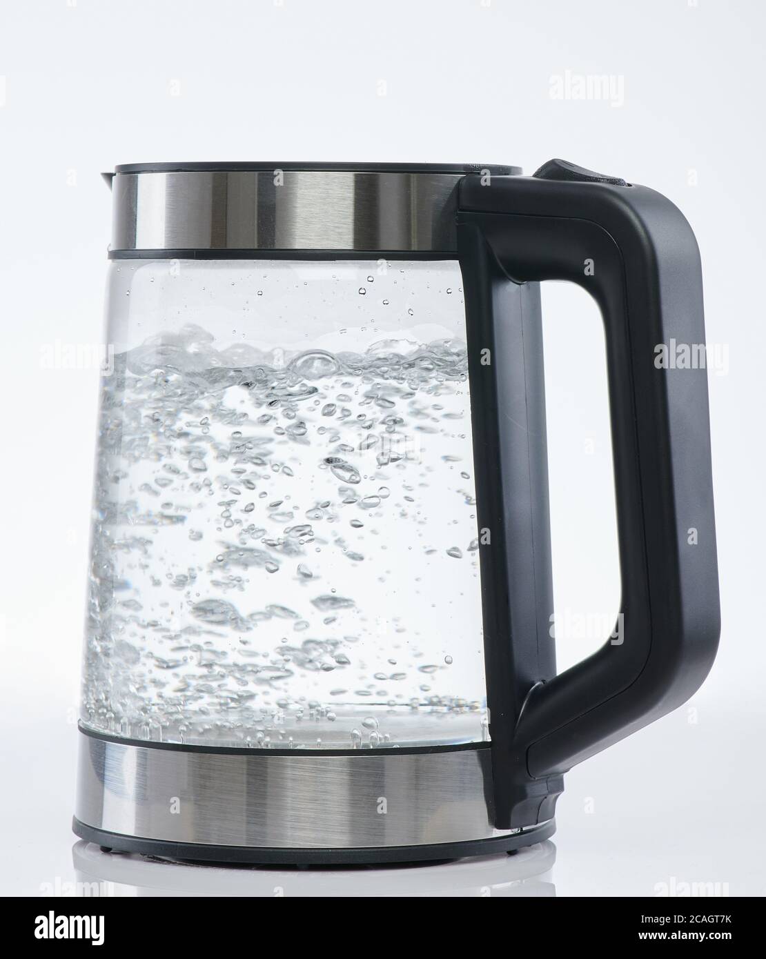 Water boiling in electric pot isolated on white studio background Stock Photo Alamy