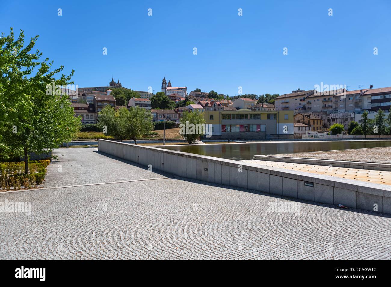 Viseu / Portugal - 07/31/2020 : View at the Viseu city downtown and Cathedral of Viseu and Church of Mercy on top Stock Photo