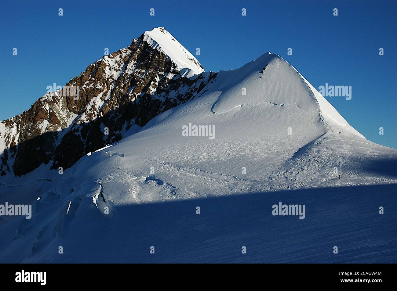 The sharp and aerial ridge of Eastern Lyskam, Monte Rosa chain Stock ...