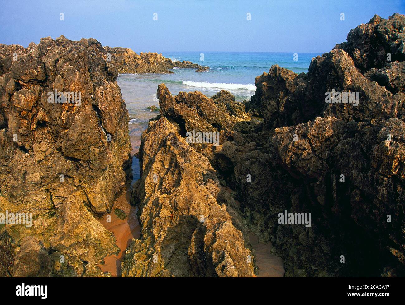 Rocks and beach. Dunas de Liencres Nature Reserve, Cantabria, Spain. Stock Photo