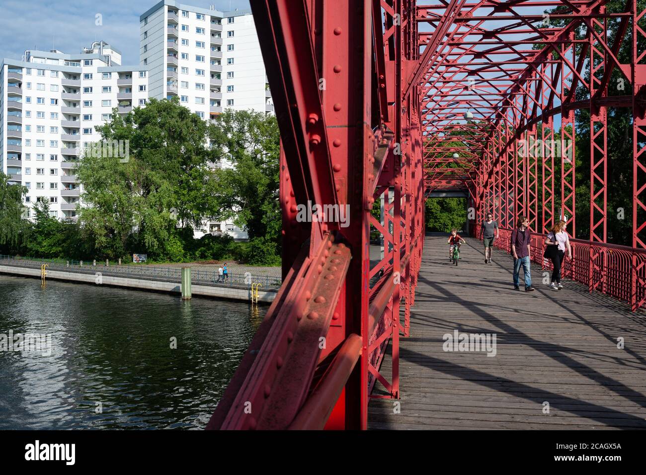 13.06.2019, Berlin, , Germany - The Tegel harbour bridge (Sechserbruecke) connects both banks at Tegeler Fliess and Tegel harbour in the district of R Stock Photo