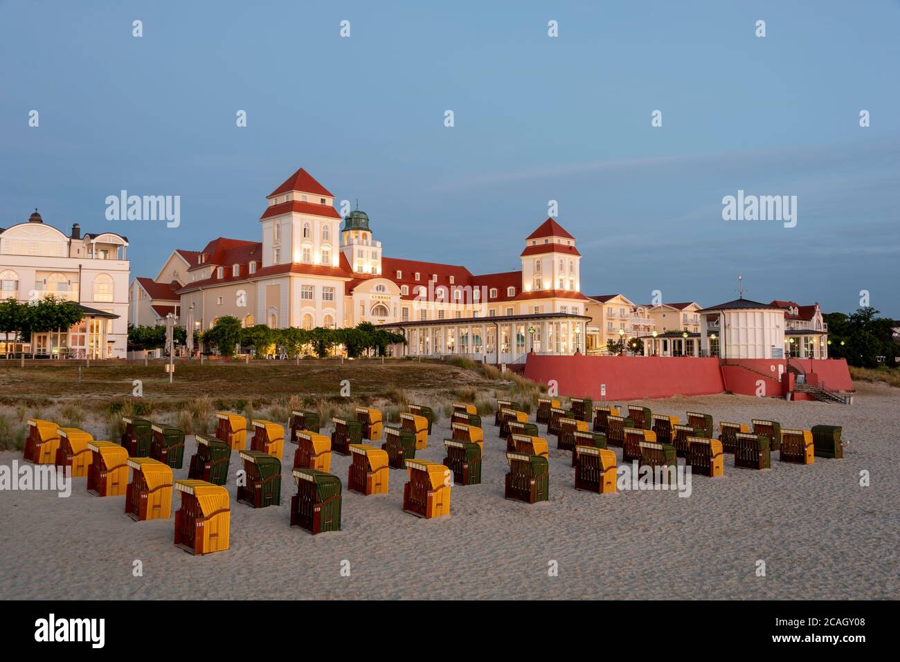 05 August 2020, Mecklenburg-Western Pomerania, Binz: Yellow and green beach chairs stand in front of the spa hotel of the largest seaside resort on the island of Rügen. Photo: Stephan Schulz/dpa-Zentralbild/ZB Stock Photo