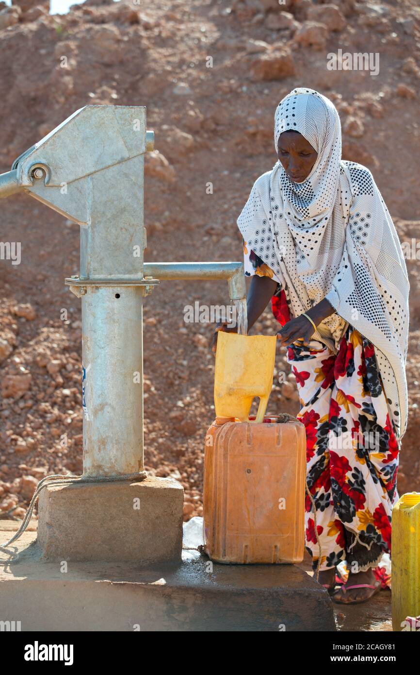 13.11.2019, Gabradahidan, Somali Region, Ethiopia Woman fills a
