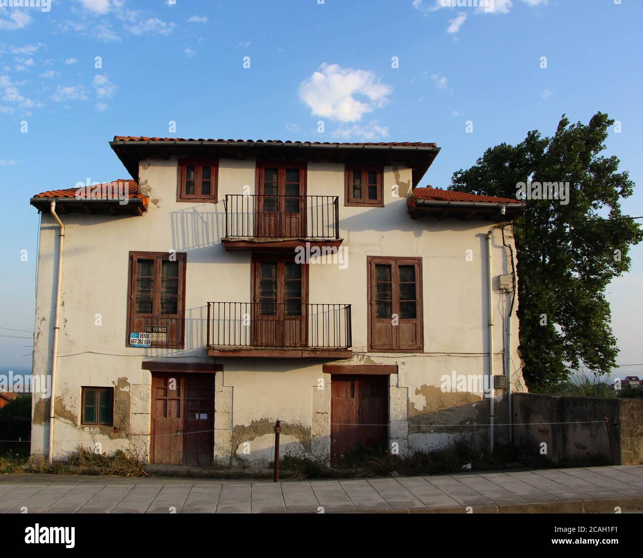 Old delapidated house for sale in Cueto Cantabria Spain Stock Photo