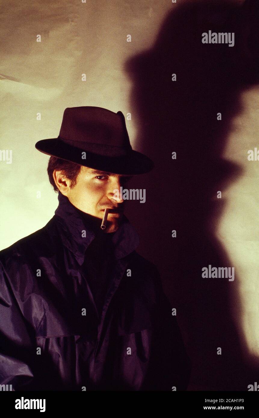 Man posing as a gangster. Stock Photo