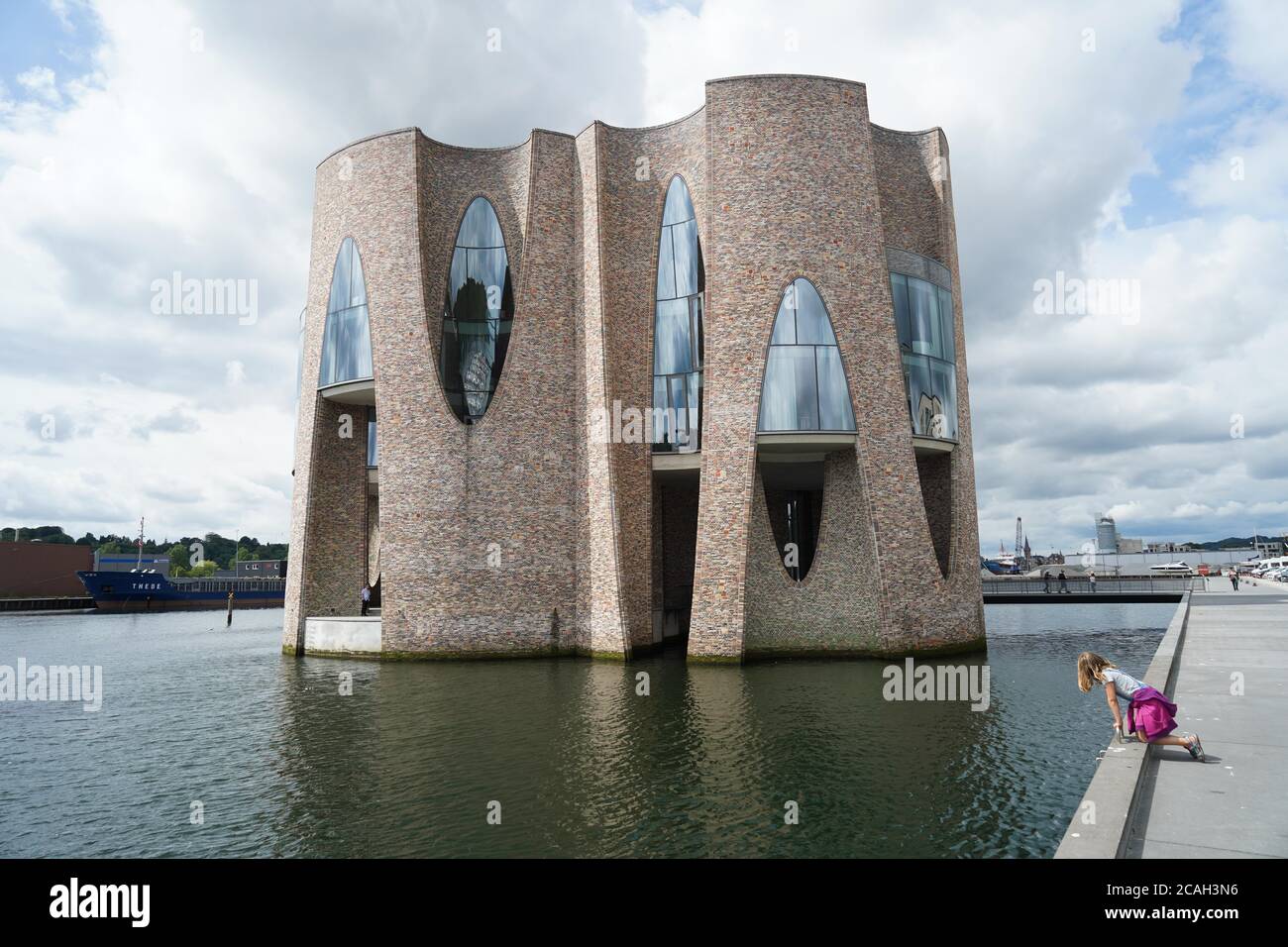 Vejle, Denmark. 25th July, 2020. View of the fjord house at the harbour  front of Vejle. The creator of this building in the harbour basin is the  world famous Danish-Icelandic artist Olafur