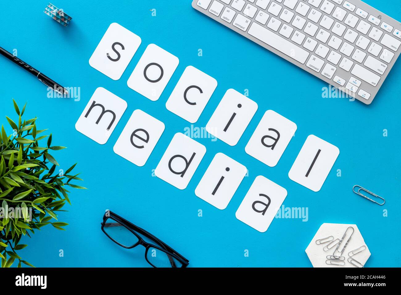 Above view of web network media marketing job. Office table flat lay Stock Photo