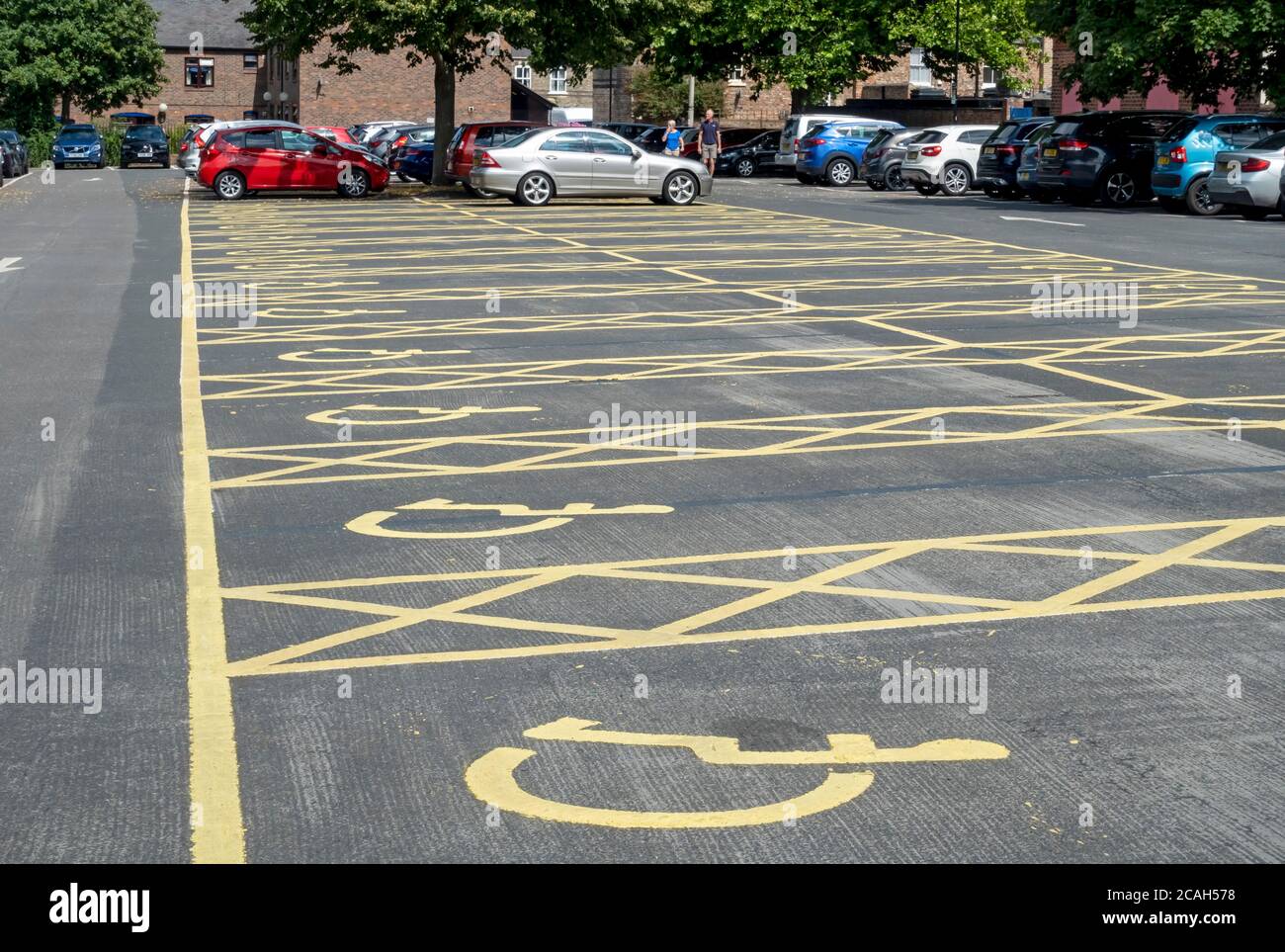 Disabled parking space spaces in city town car park York North Yorkshire England UK United Kingdom GB Great Britain Stock Photo