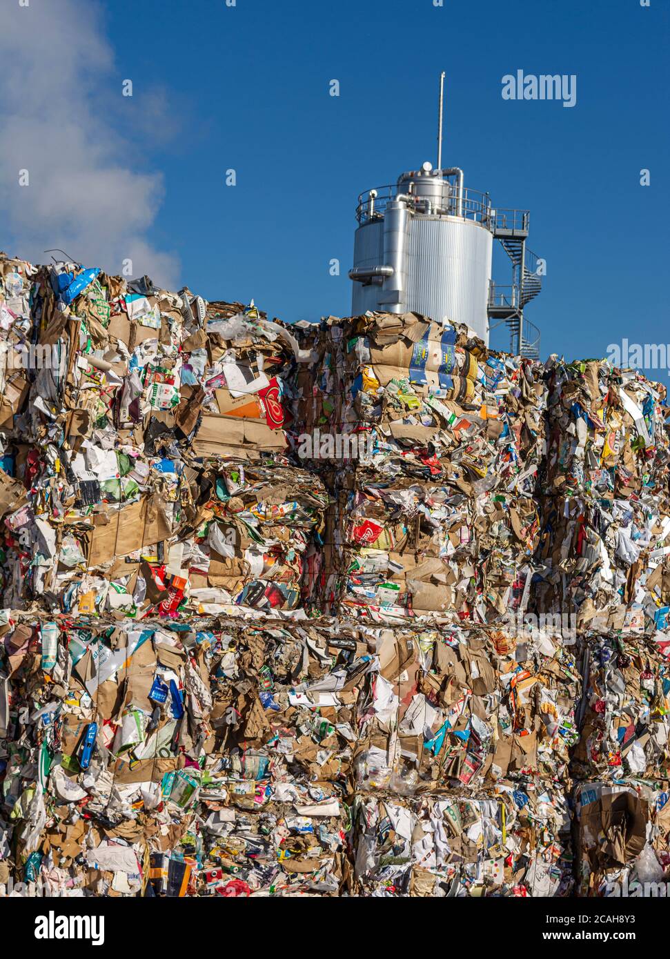 Sweden, Orebro, 24.02.2020: Bales of cardboard and box board. Waste paper for Recycling. Background of paper textures, Paper garbage at the recycling Stock Photo