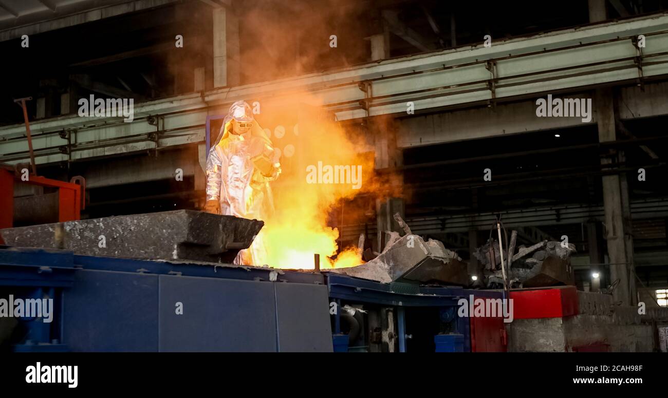 red-hot molten steel in a iron and steel enterprise production scene ...