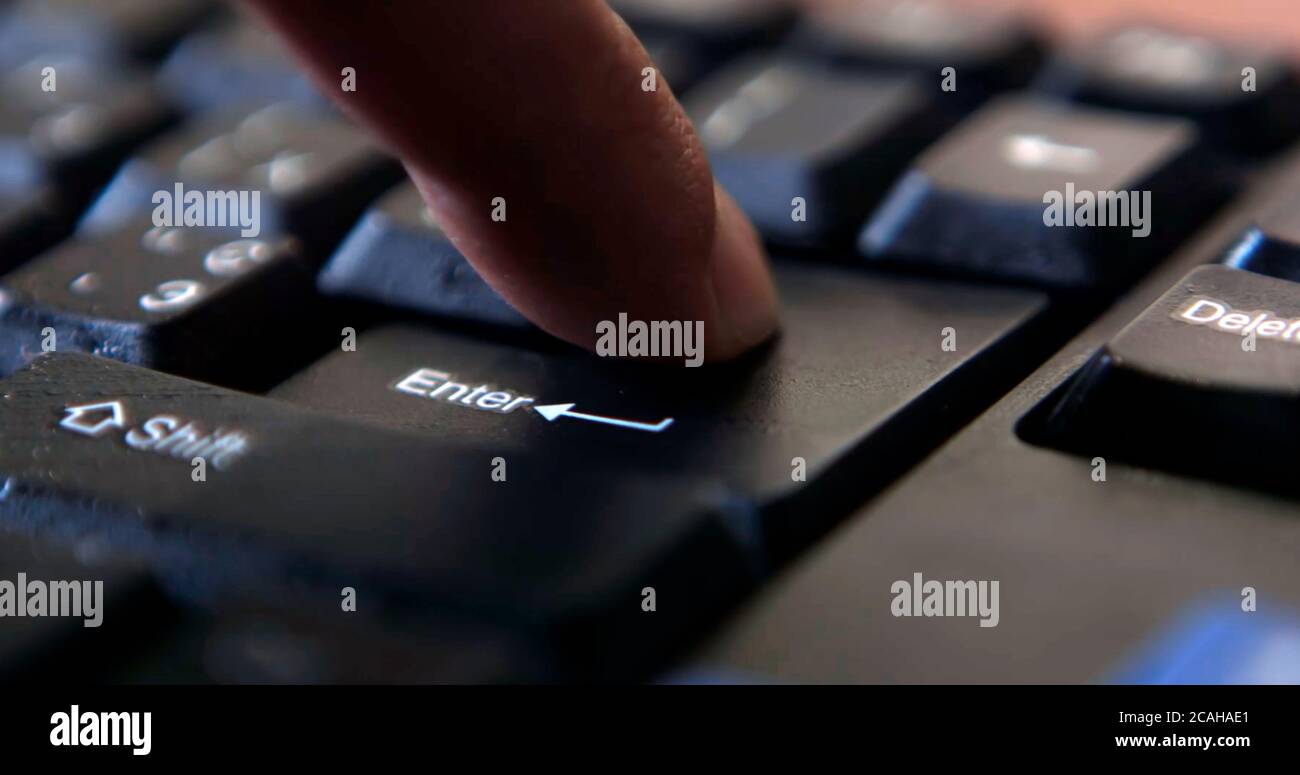 Black computer keyboard super close up stock footage. Black computer enter keys Stock Photo