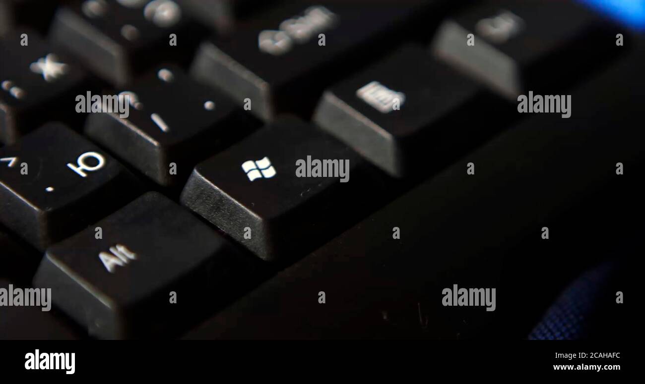 Black computer keyboard super close up stock footage. Black computer enter keys Stock Photo