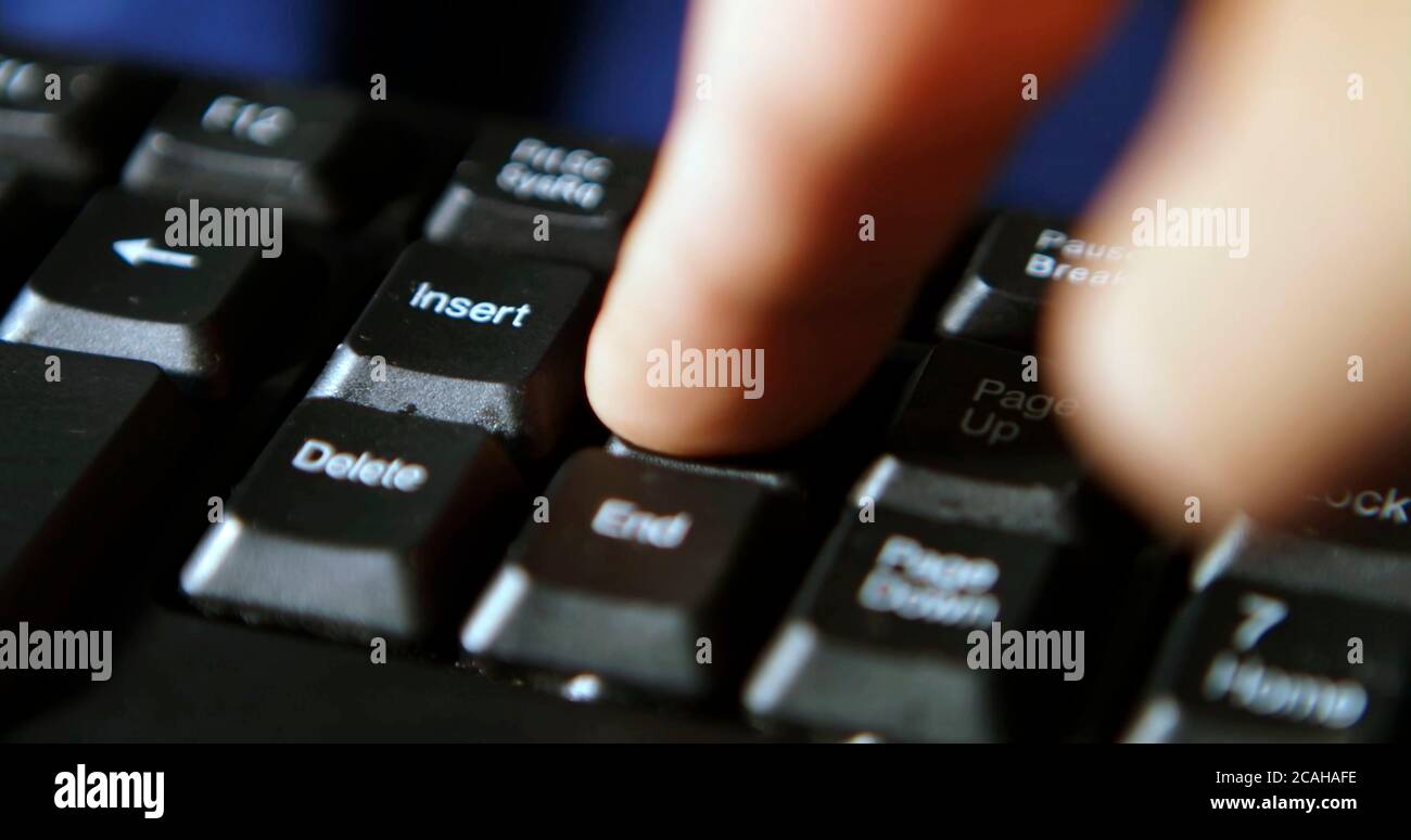Black computer keyboard super close up stock footage. Black computer enter keys Stock Photo
