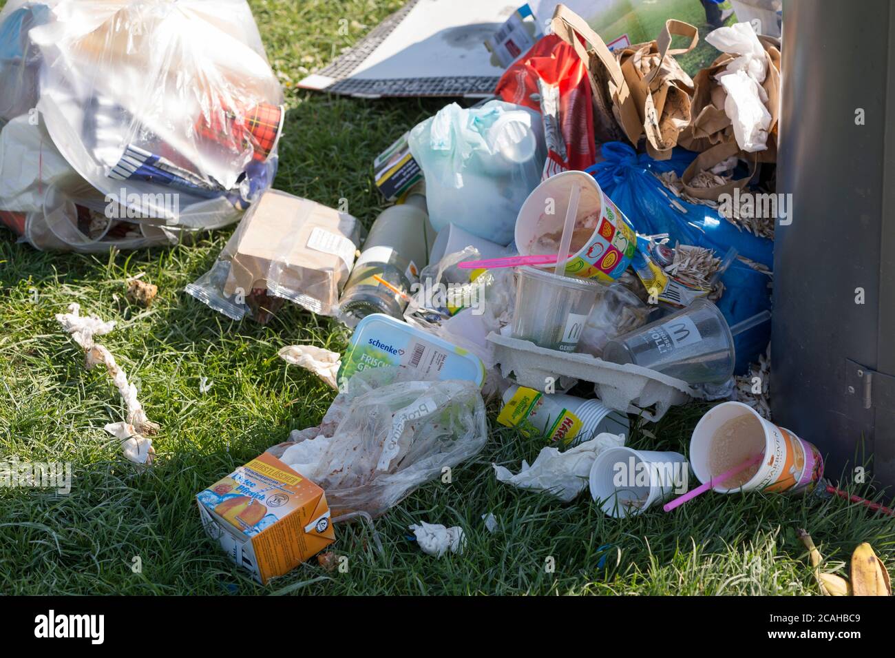 Litter overflowing from bins in Germany Stock Photo