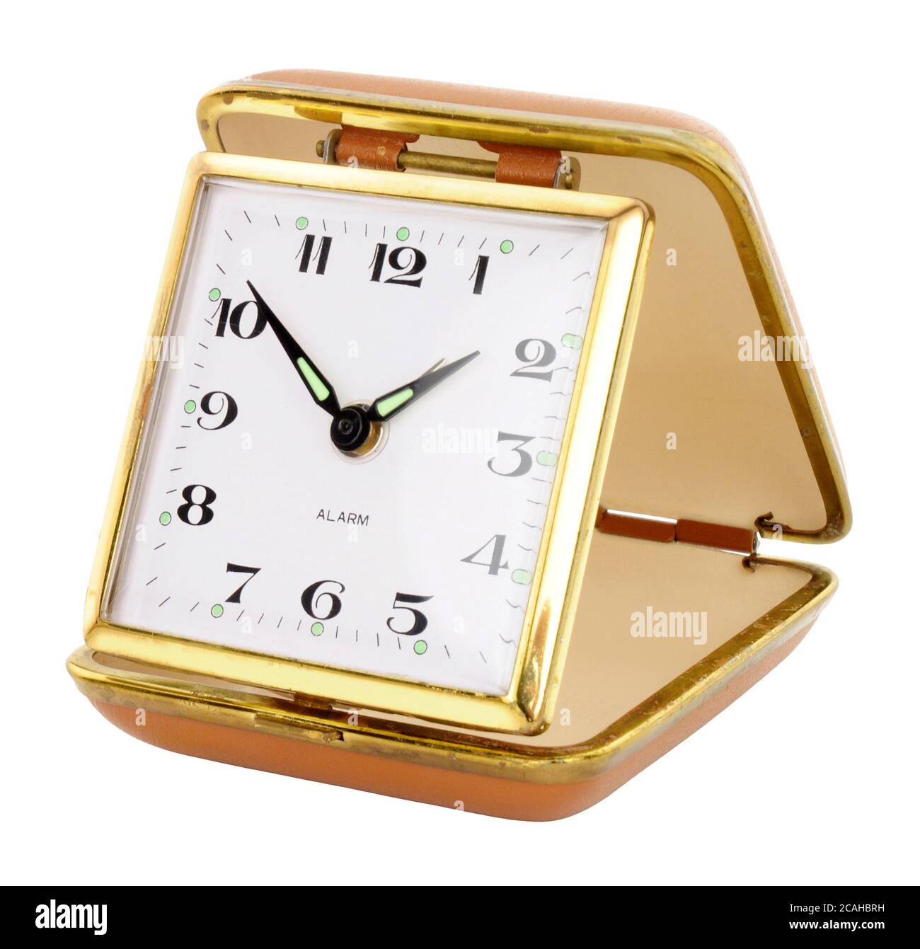 Old retro travel alarm clock isolated on a white background Stock Photo