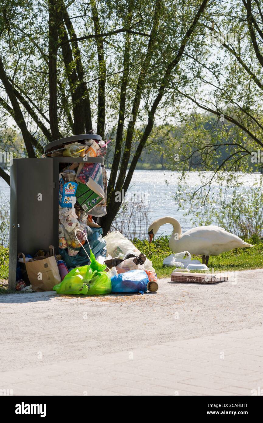 Litter overflowing from bins in Germany Stock Photo Alamy
