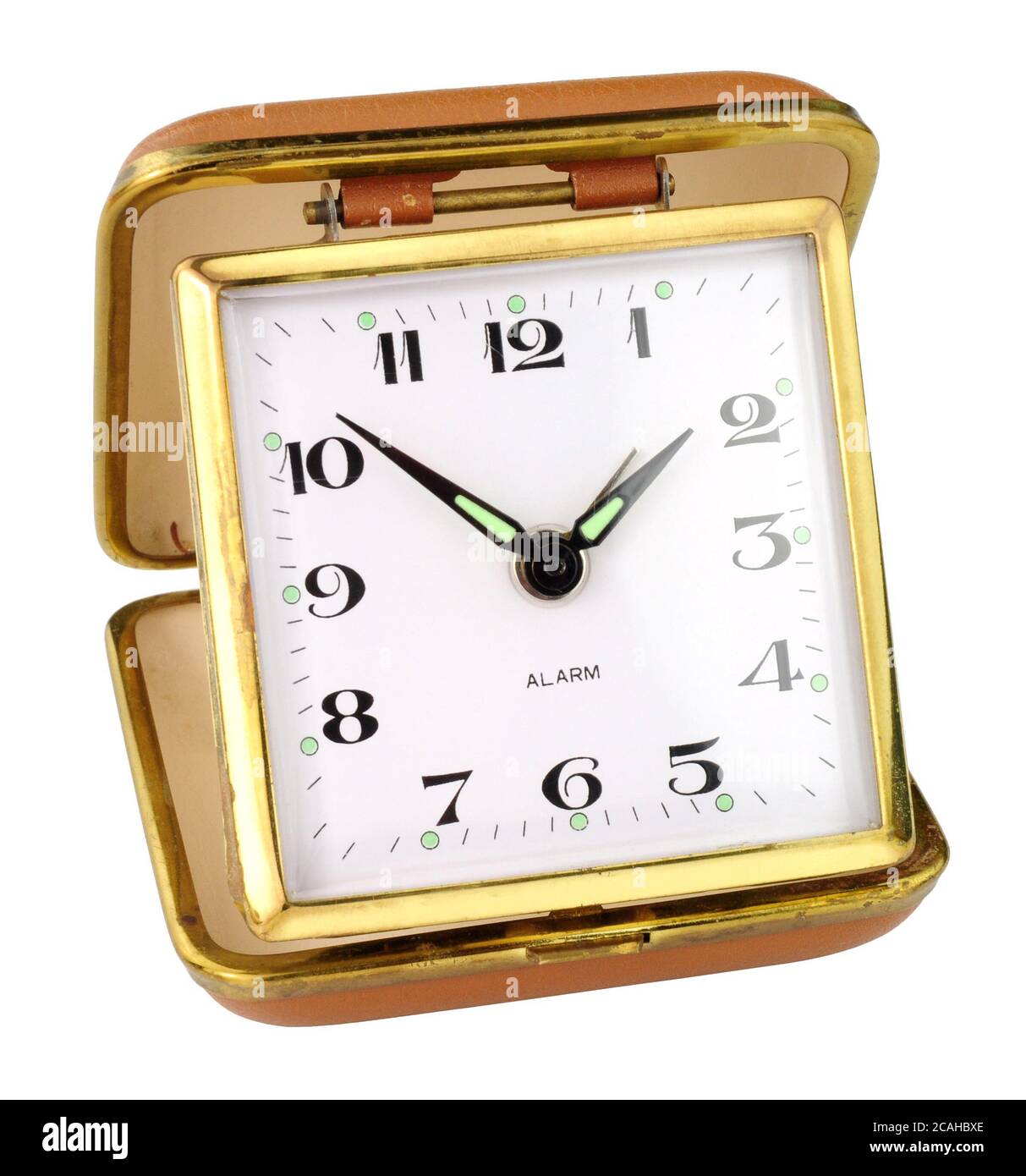 Old retro travel alarm clock isolated on a white background Stock Photo