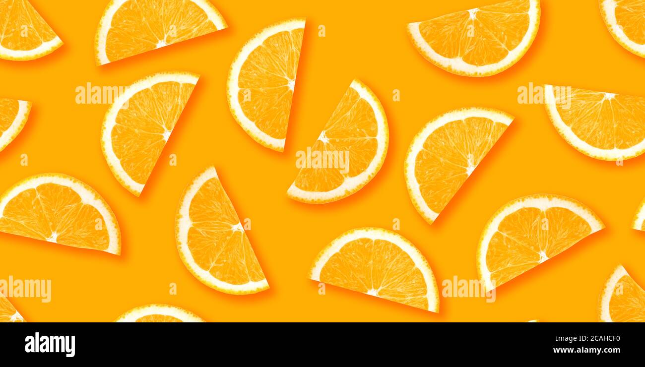 Orange citrus slices seamless backdrop texture. Flat lay backdrop Stock Photo