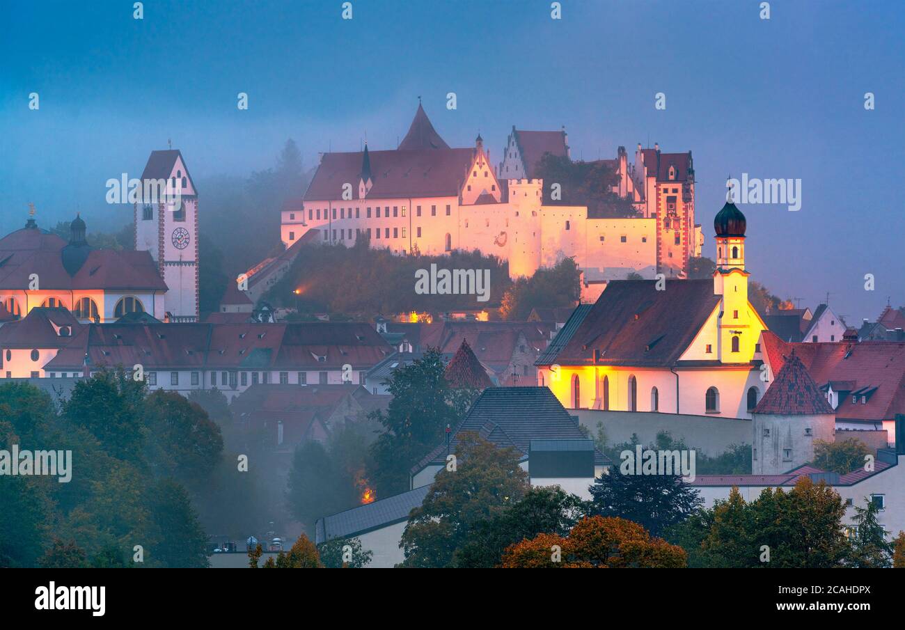 Fussen, Germany old town on the Lech River during a foggy twilight. Stock Photo