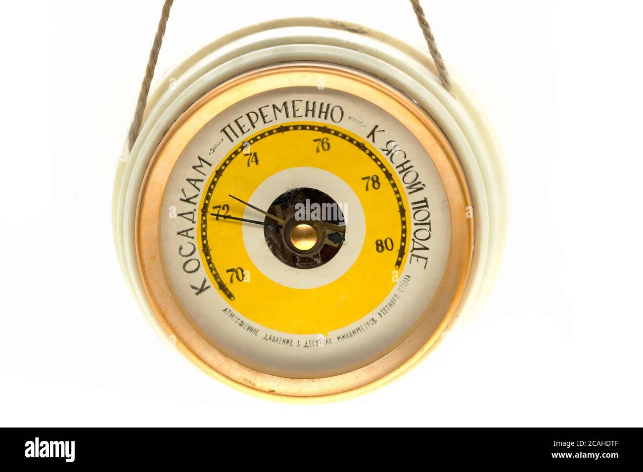 Unbranded vintage barometer, English translation of the text on the top is Rain, Change and Fair. Bottom one is Atmospheric pressure in tens of mmHg Stock Photo