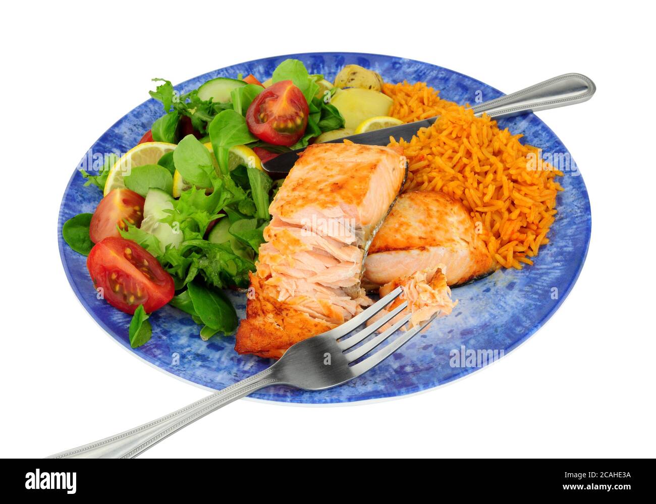 Grilled salmon fish fillets with chilli flavoured rice and salad meal