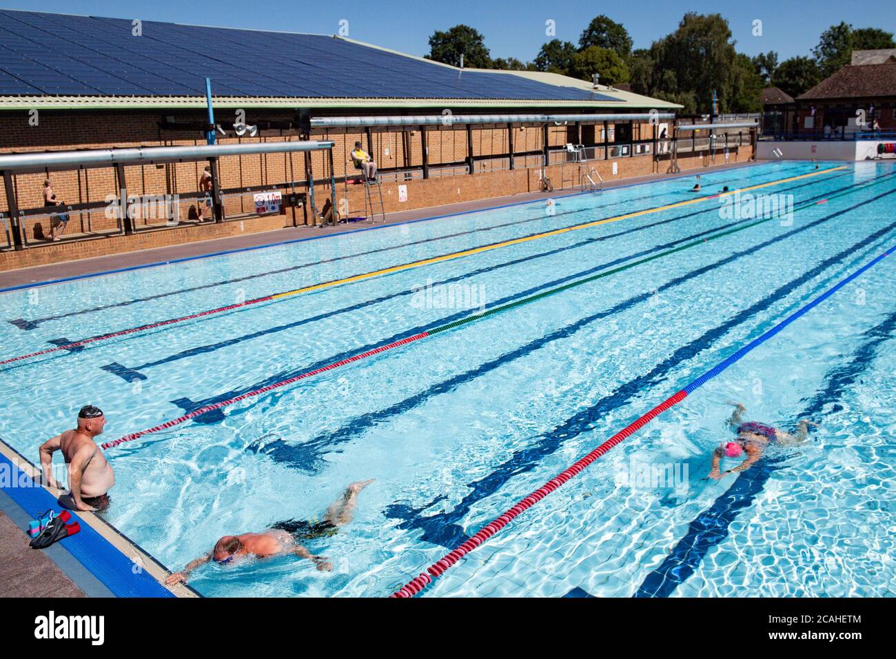 Swimmers enjoy the pool at Woodgreen Leisure Centre, Oxfordshire, as
