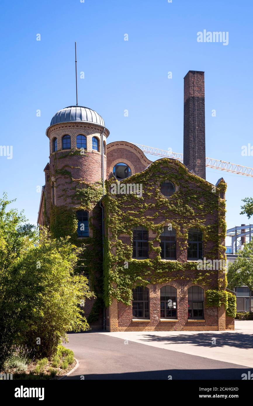 the tower house on the site of the former Vulkan lighting factory in the Ehrenfeld district, an ensemble of heritage-listed and new buildings, today a Stock Photo