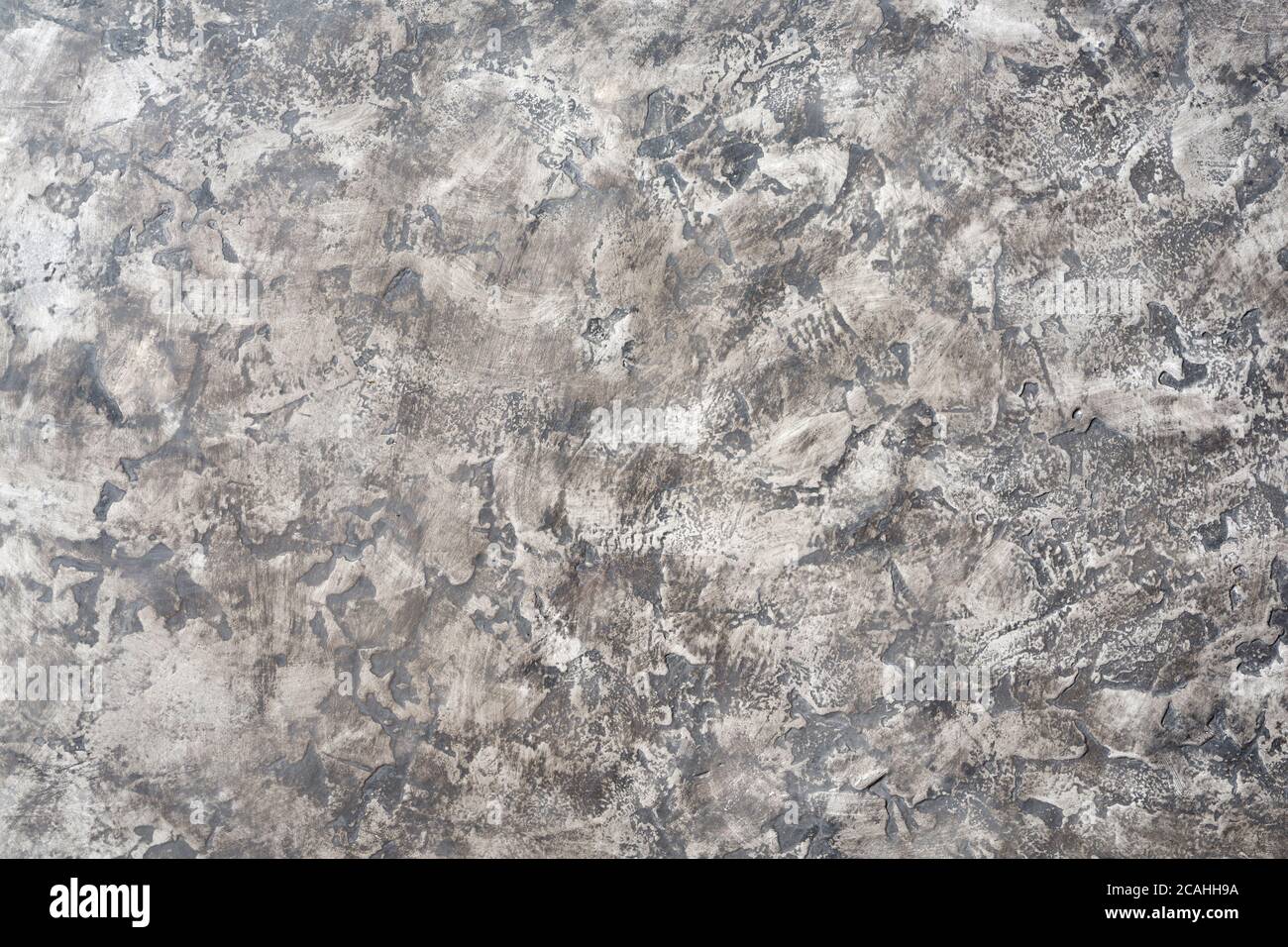 Pattern of old gray decorative plaster on the wall Stock Photo
