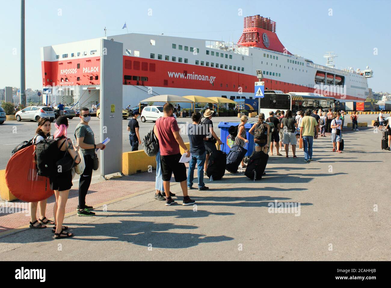 Greece, Piraeus, August 1 2020 - Passengers waiting for buying tickets and embark on a ferry boat with Greek islands as destination. Stock Photo