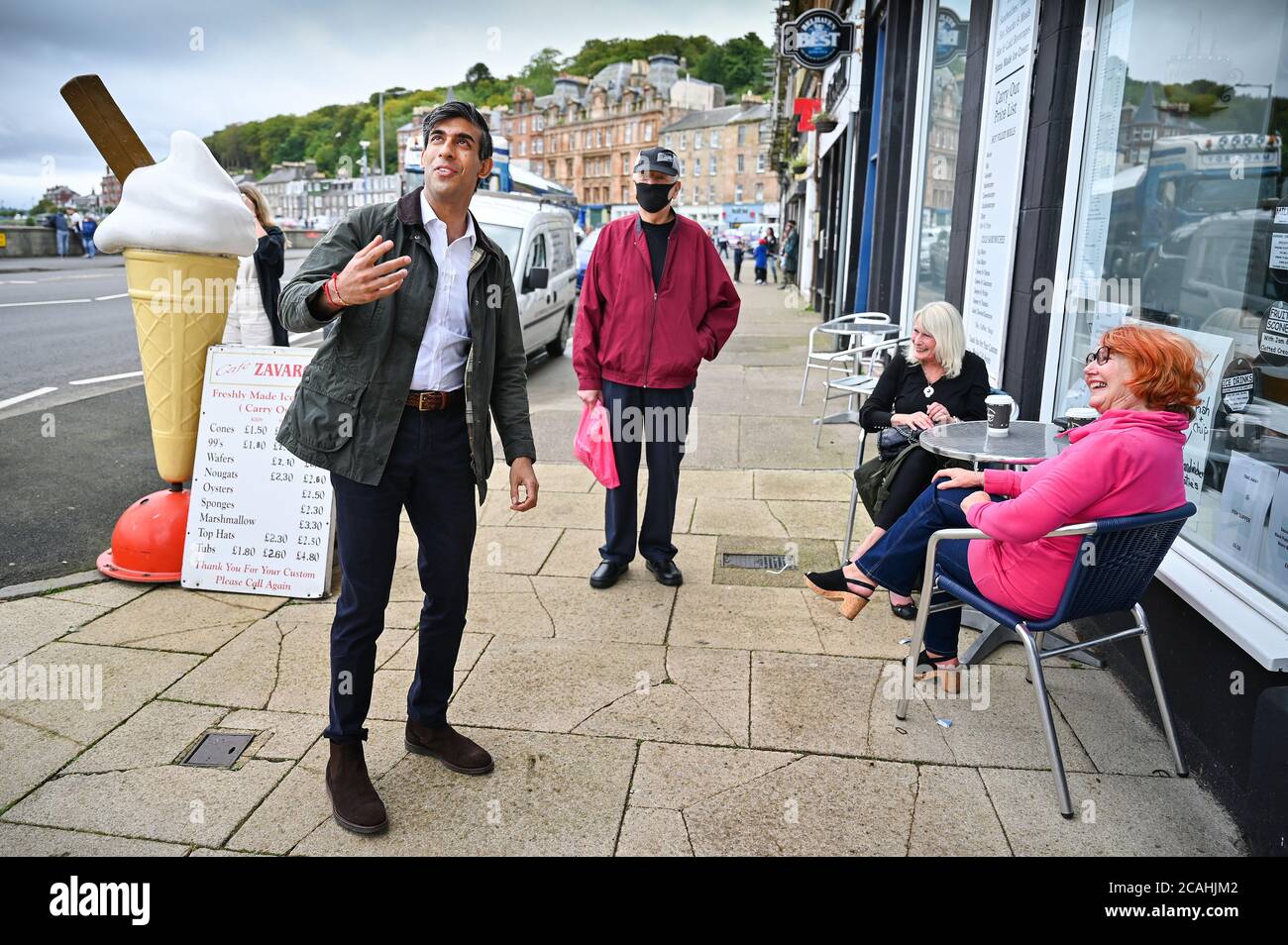 Chancellor of the Exchequer Rishi Sunak speaks with members of the public during a visit to Rothesay on the Isle of Bute, Scotland. Stock Photo
