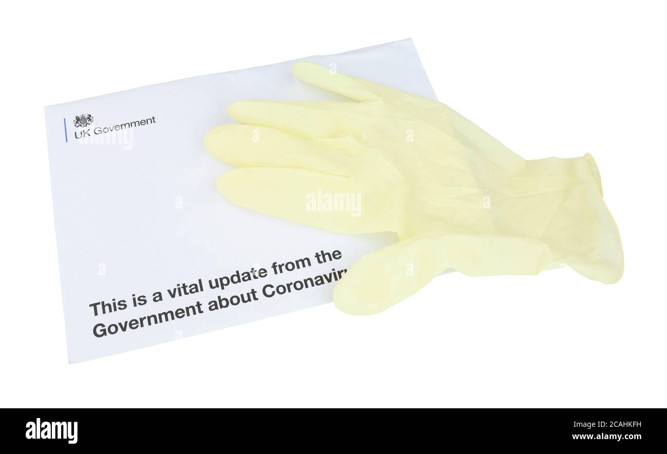 Letter envelope from United Kingdom Government to every household in UK with vital updates about Coronavirus and lock down rules, isolated on white Stock Photo