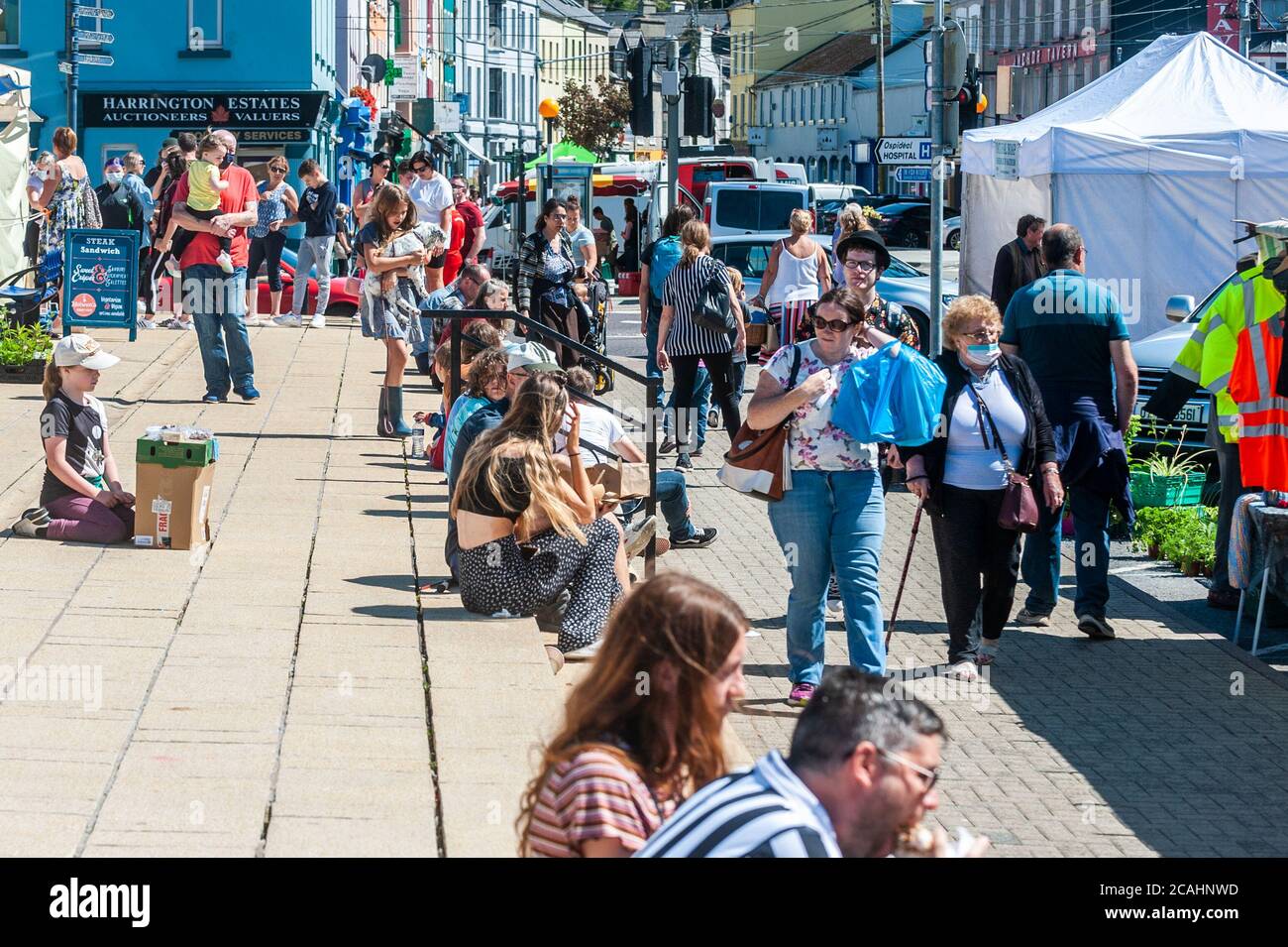 Bantry, West Cork, Ireland. 7th Aug, 2020. The sun shone on Bantry Friday Market today, which brought people out in their droves. It appeared Social Distancing was out of the window as very few people wore masks and Bantry Square was very crowded. The rest of the day will be dry and sunny with highs of 17 to 23 degrees. Credit: AG News/Alamy Live News Stock Photo