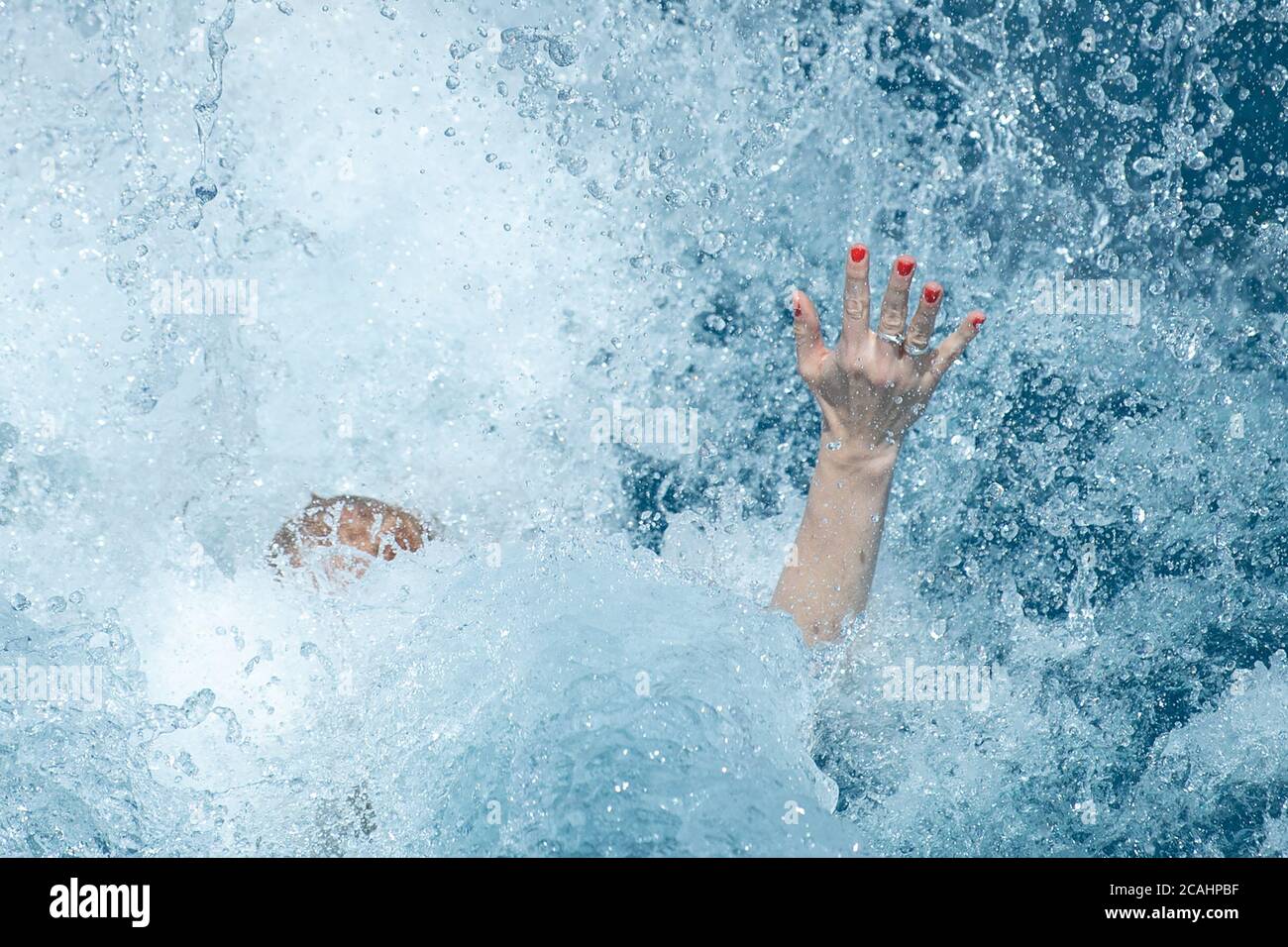 Stuttgart, Germany. 07th Aug, 2020. A woman dives into the pool in the Inselbad. Credit: Sebastian Gollnow/dpa/Alamy Live News Stock Photo