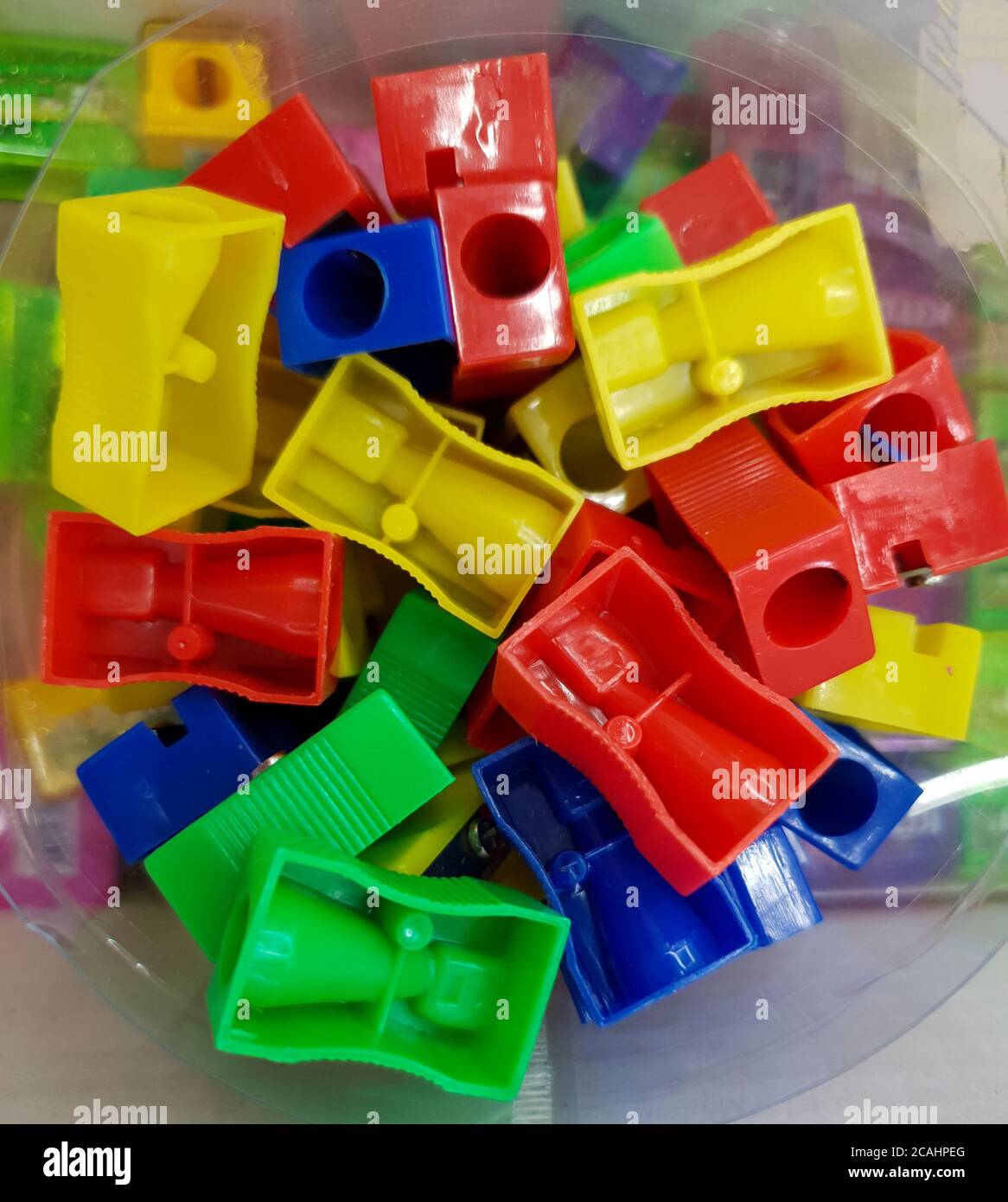 multi-colored pencil sharpeners at the store sale Stock Photo