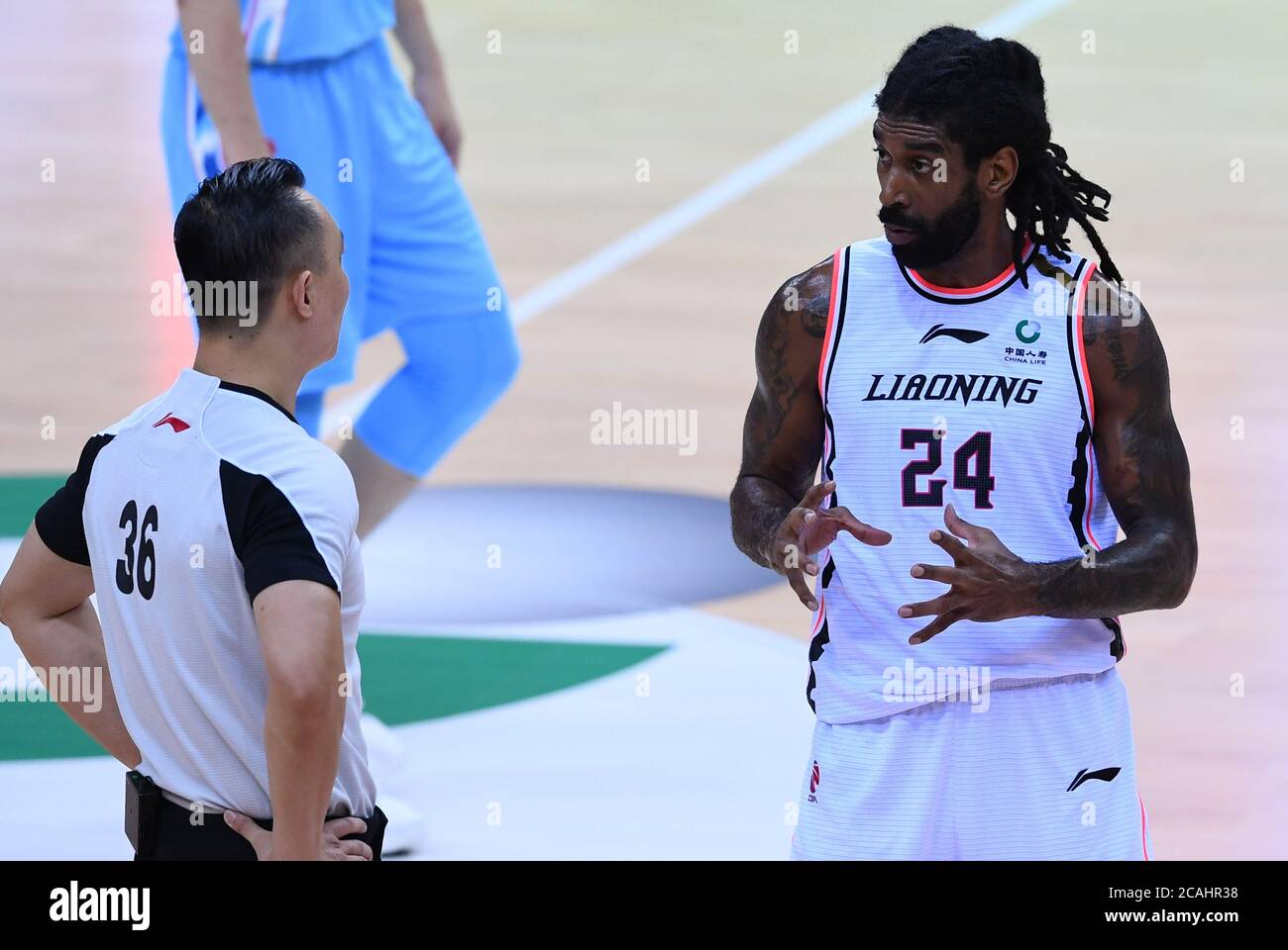 (200807) -- QINGDAO, Aug. 7, 2020 (Xinhua) -- O.J. Mayo (R) of Liaoning Flying Leopards reacts during the semifinal match between Liaoning Flying Leopards and Xinjiang Flying Tigers at the 2019-2020 Chinese Basketball Association (CBA) league in Qingdao, east China's Shandong Province, Aug. 7, 2020. (Xinhua/Zhu Zheng) Stock Photo