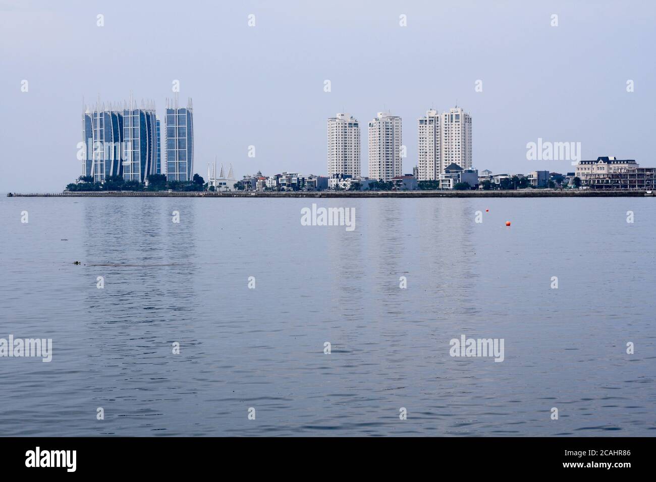 Jakarta, Indonesia - April 21, 2019: Pantai Mutiara Apartment seen from Muara Angke Port in North Jakarta. Stock Photo