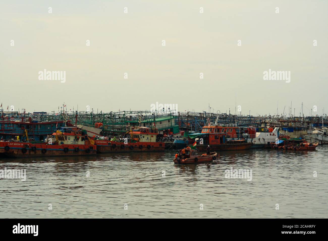 Jakarta, Indonesia - April 21, 2019: Fishing boats anchored at the Muara Angke Port, Penjaringan, North Jakarta. Stock Photo
