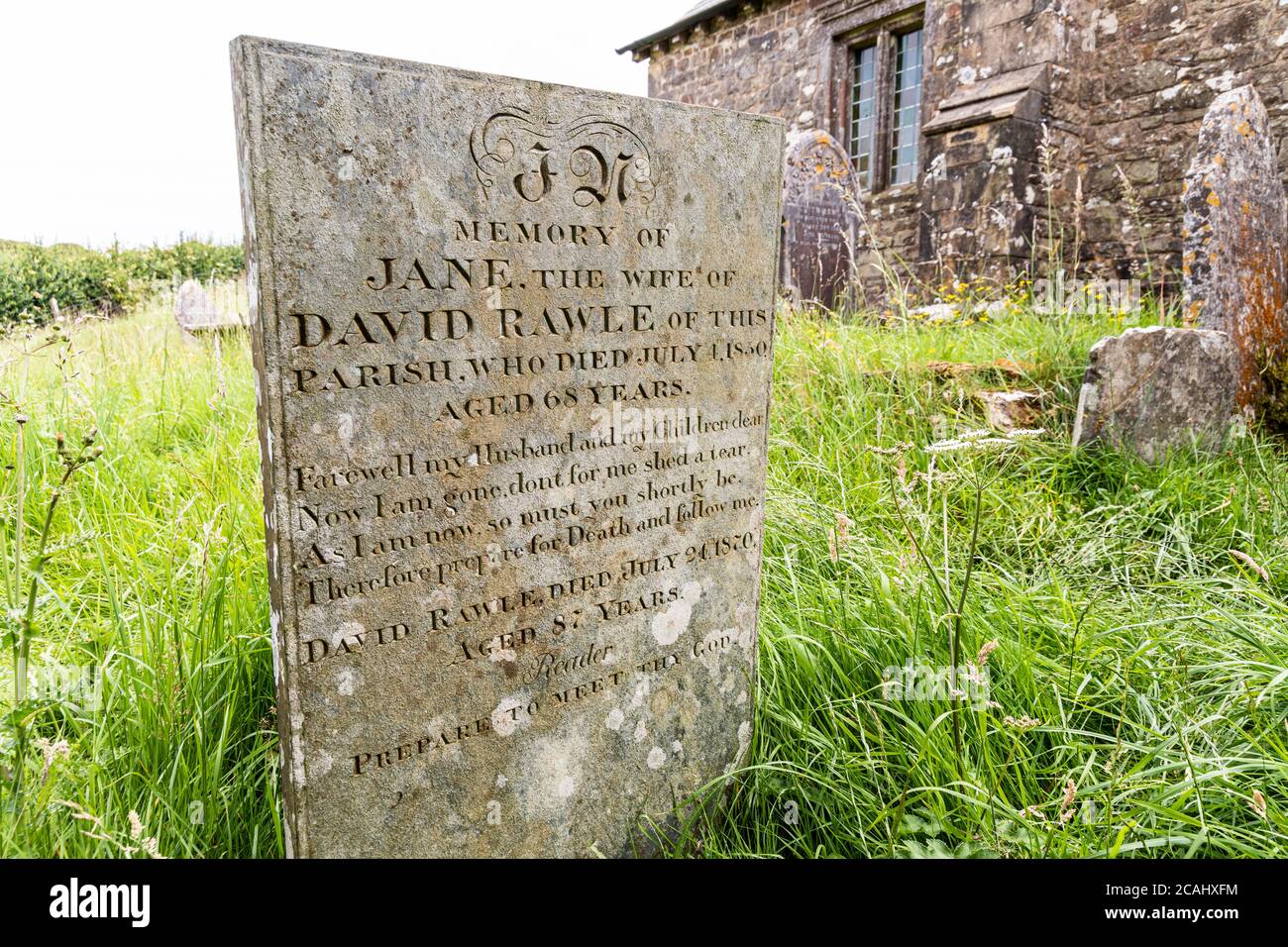 Exmoor National Park - 19th century gravestone of Jane Rawle (died 1850) in the churchyard of Stoke Pero church, Somerset UK - Prepare to meet thy God Stock Photo