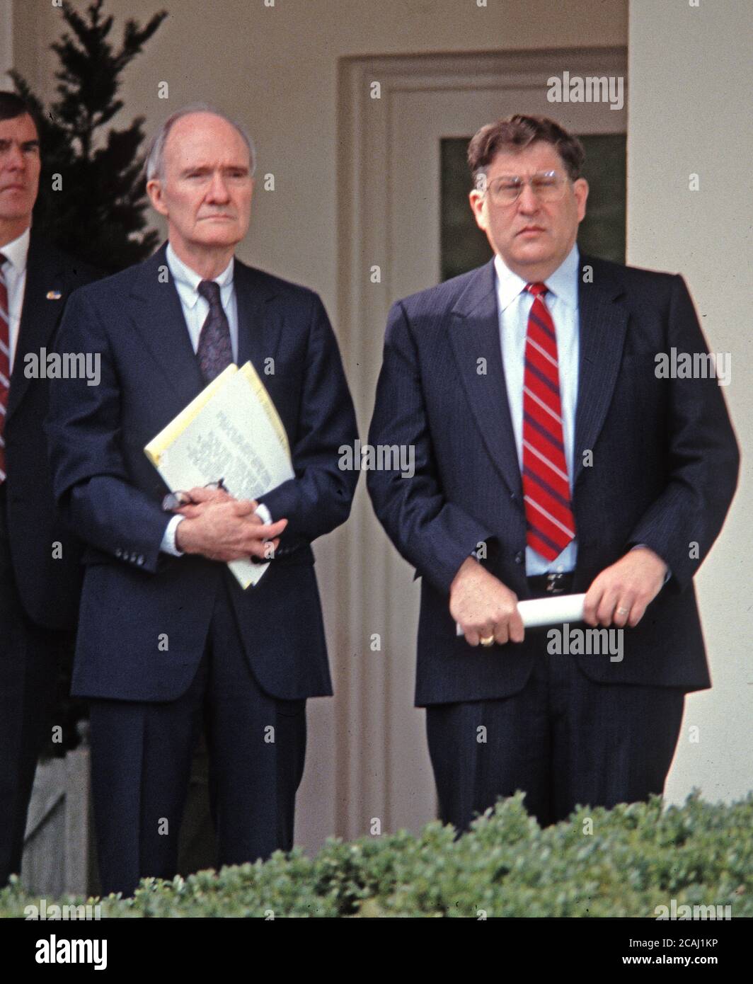 In this file photo, National Security Advisor Brent Scowcroft and White House Chief of Staff John Sununu look on as United States President George H.W. Bush (not pictured) reads a statement rejecting the proposed Soviet peace agreement to end the Gulf War with Iraq in the Rose Garden of the White House in Washington, DC on February 22, 1991.Credit: Howard L. Sachs/CNP | usage worldwide Stock Photo