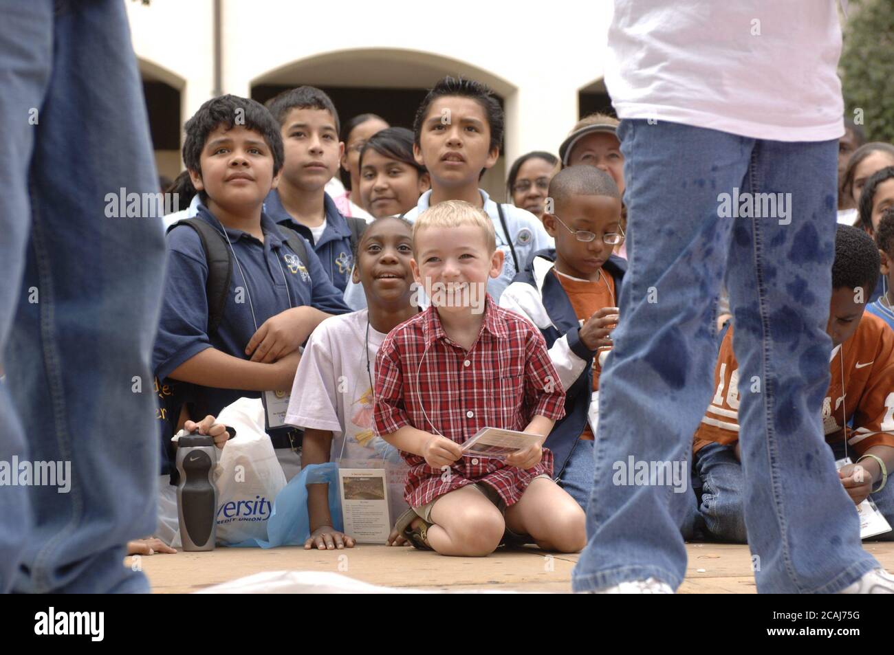 Austin, Texas USA, March 4, 2006: Children watch a 'Chemistry Circus' put on by professor Dr. David Laude as part of 'Explore UT,' an open house on the campus of the University of Texas at Austin. ©Bob Daemmrich Stock Photo