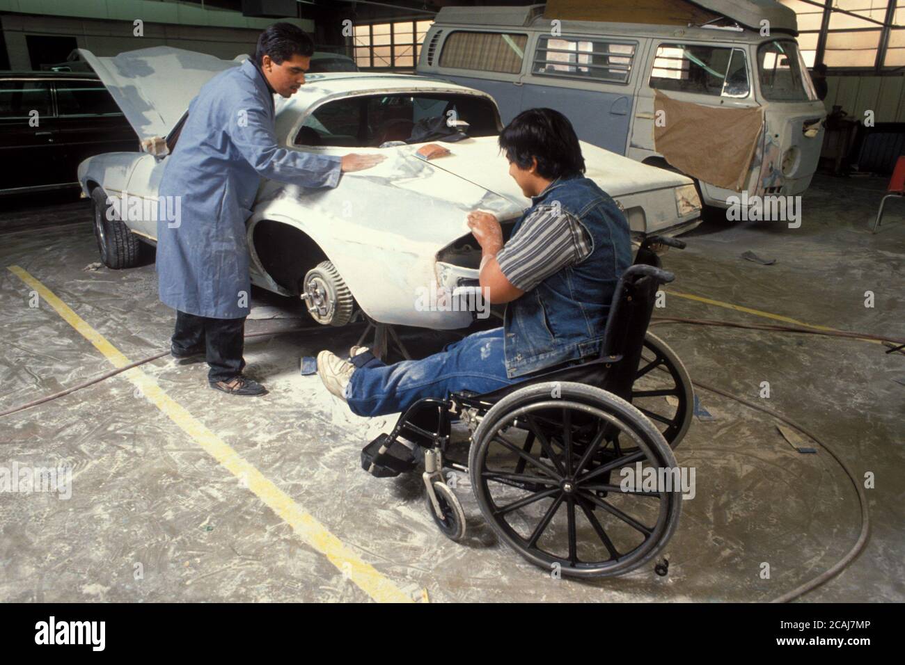 Learning auto body skills in high school hires stock photography and