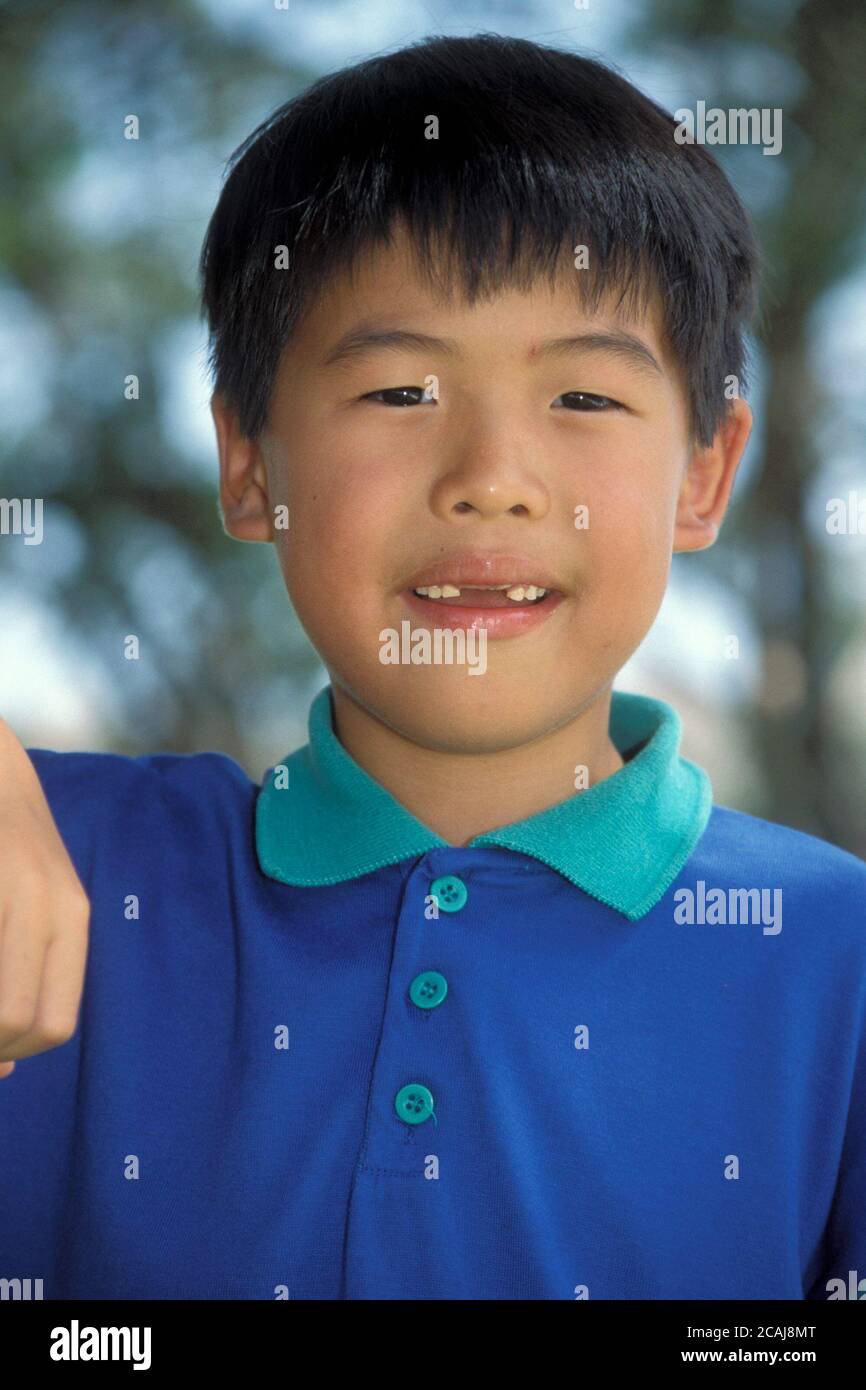 Portrait of eightyearold AsianAmerican boy. Model Release. ©Bob