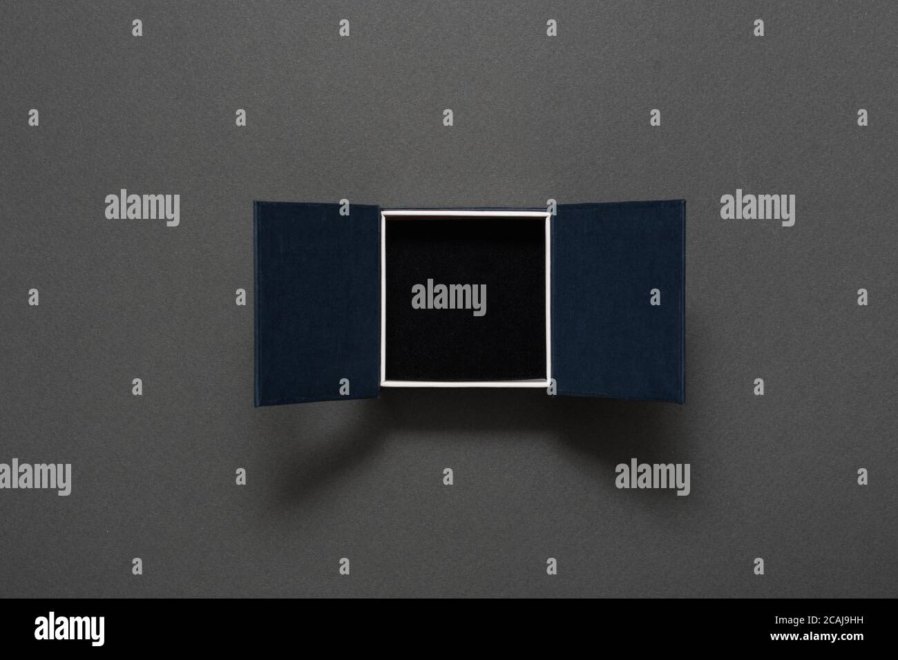 Open empty black jewelry box. Present. Black background Stock Photo