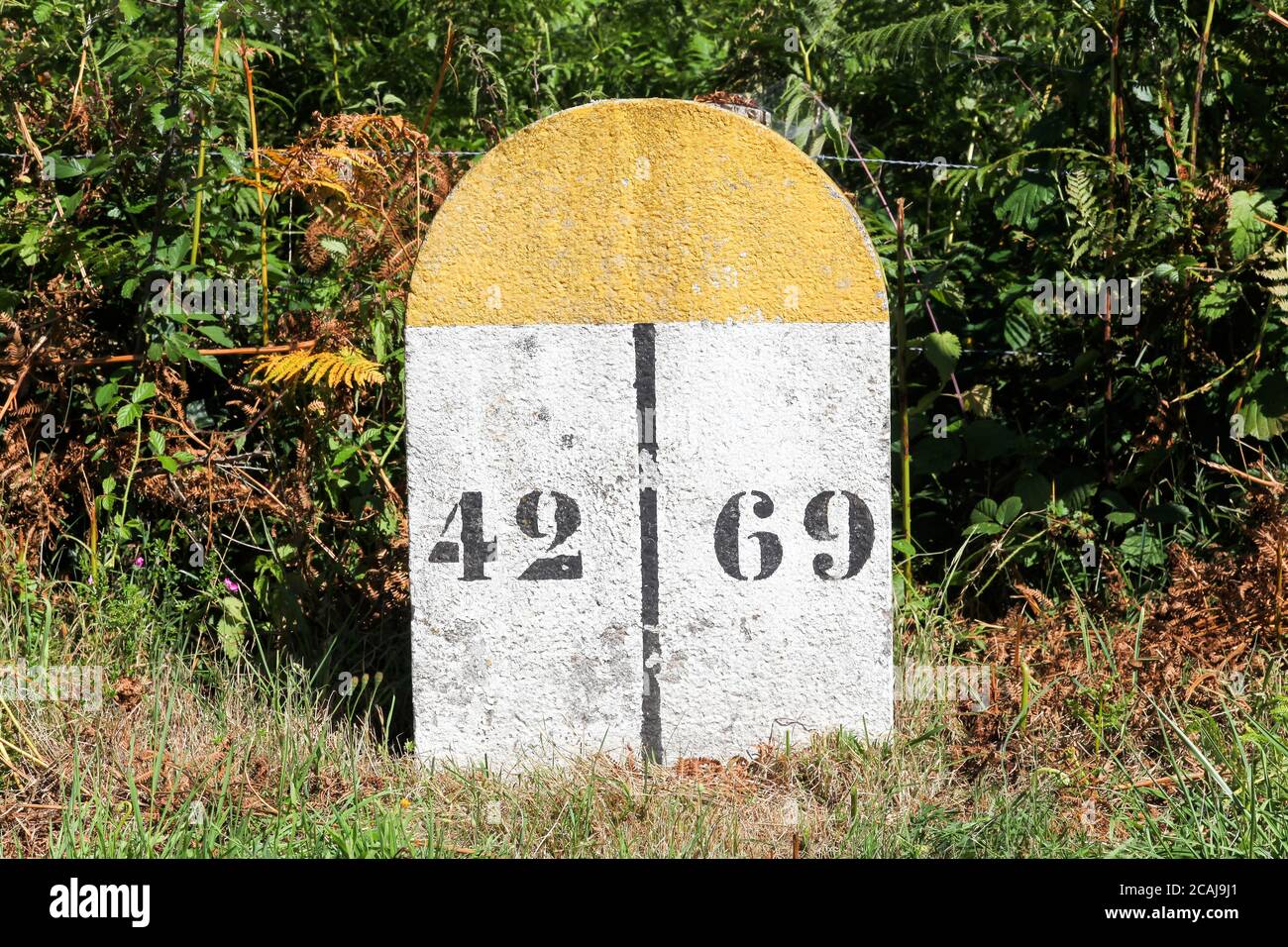 Marker with departmental border between Rhone (69) and Loire (42) in France Stock Photo