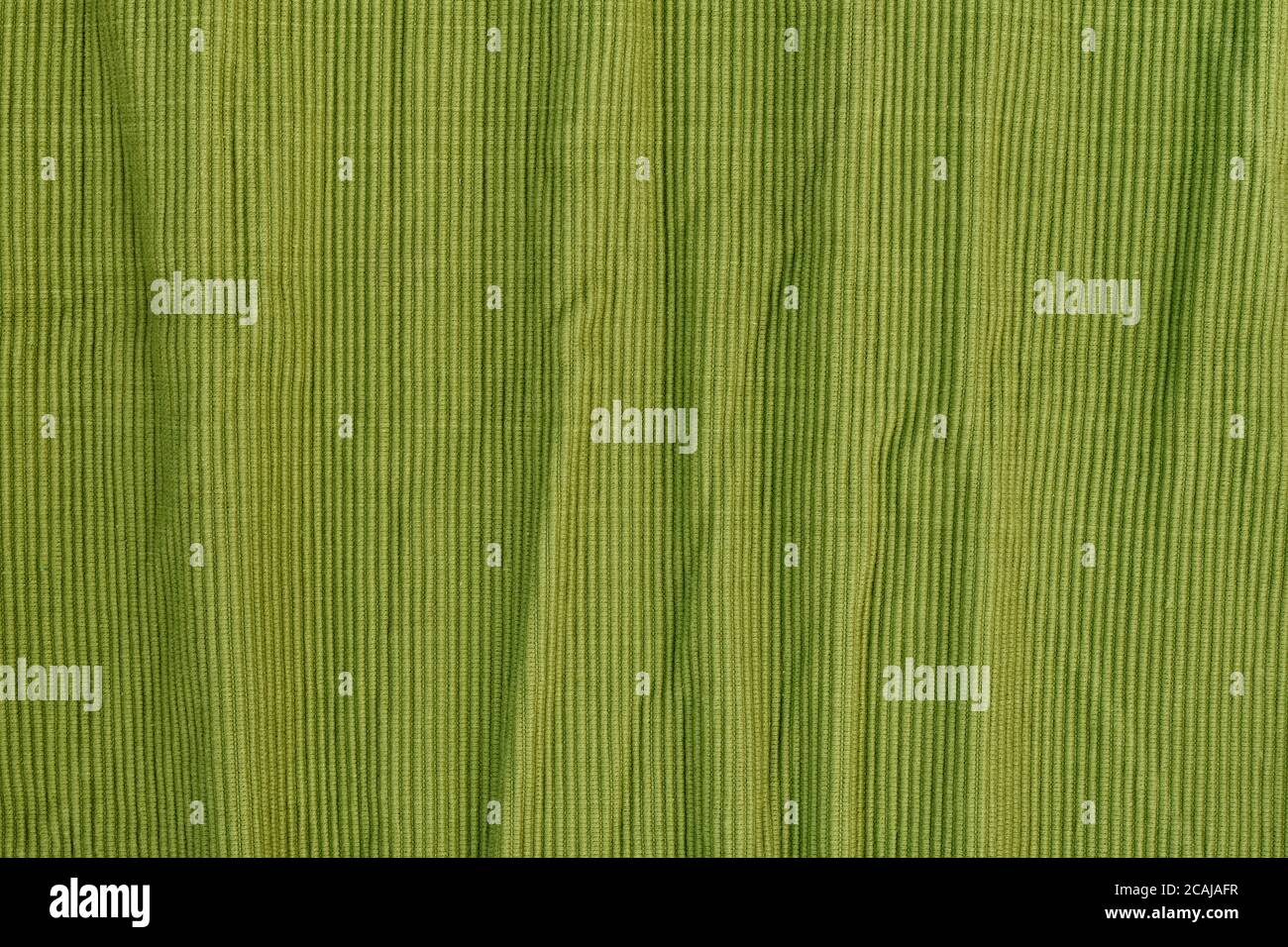 Crumpled green textured cotton fabric. Ribbed texture. Seamless ...