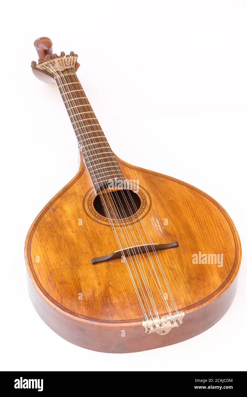 Portuguese guitar,  with tradicional fan (or peachow, watchkey) tuners - white background Stock Photo
