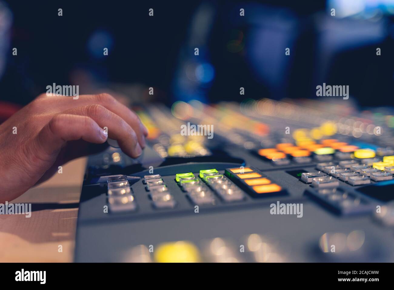 Controlled in a broadcast studio. Video mixer use Stock Photo