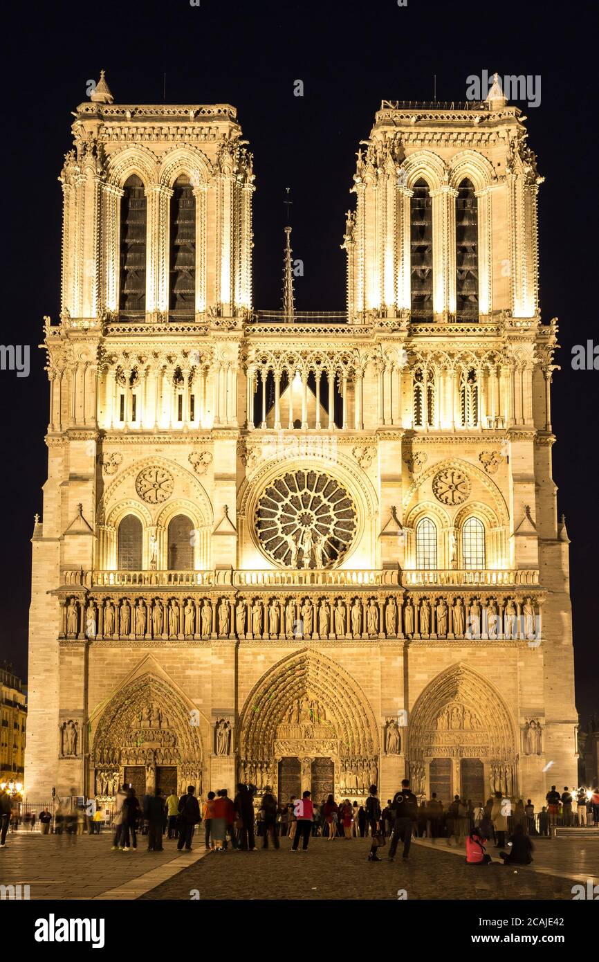 Notre Dame de Paris cathedral at night is one of the most visited places in Paris Stock Photo